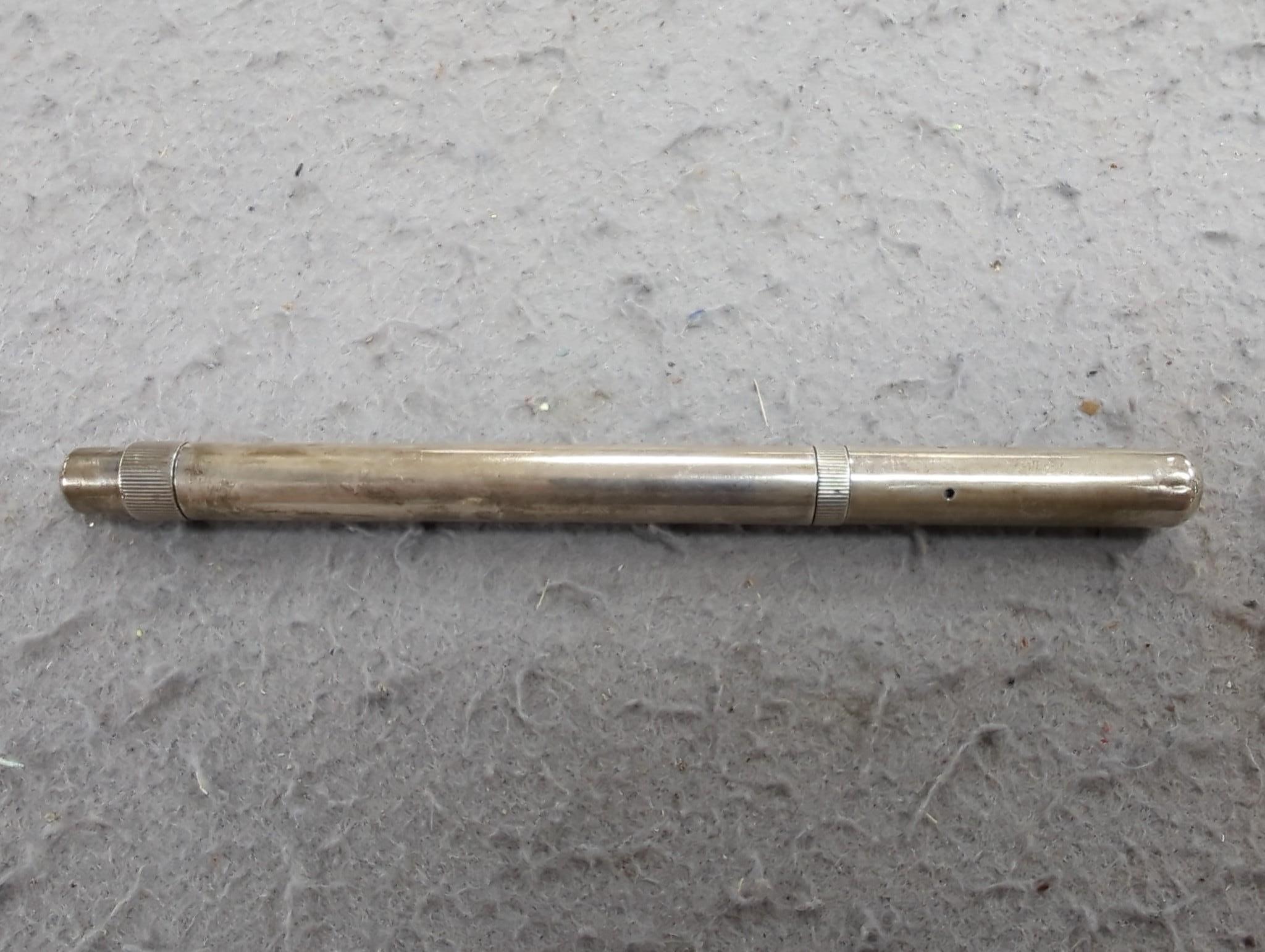 A cased Onoto silver fountain pen